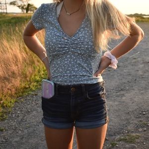 green form fitting floral top